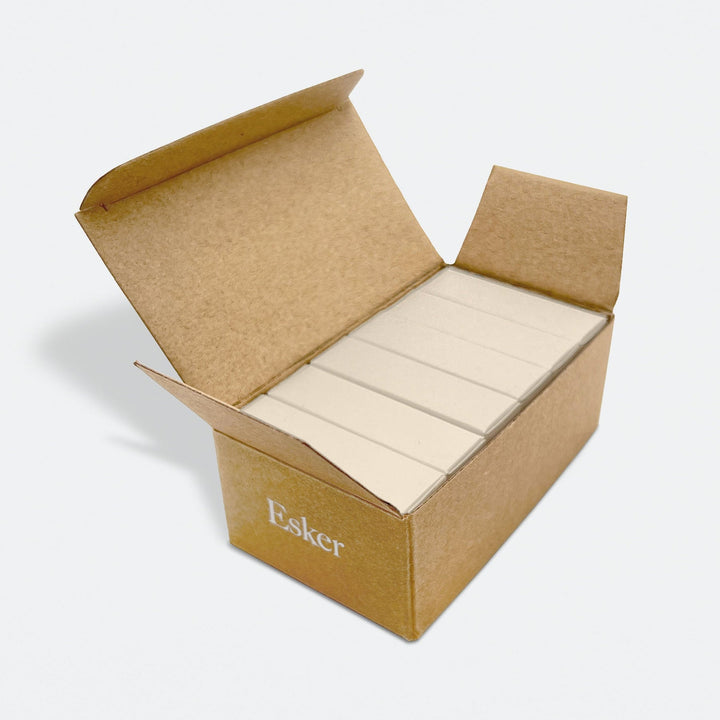 Open kraft refill box of Esker calendula shower steamer tablets