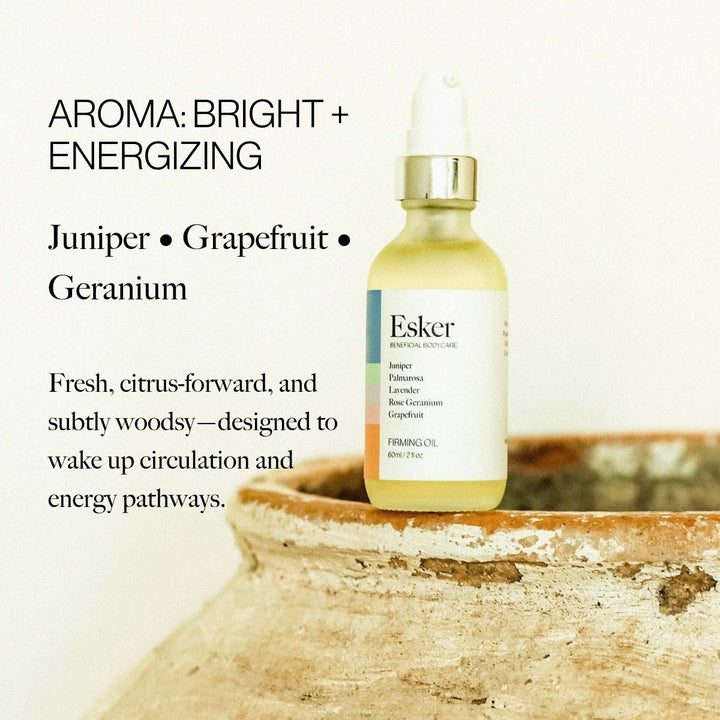 Aroma card for Esker Firming Oil Deluxe Mini: bright, energizing juniper, grapefruit, and geranium